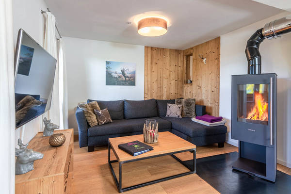 Ferienwohnung Hochsitz - Wohnzimmer mit Kamin